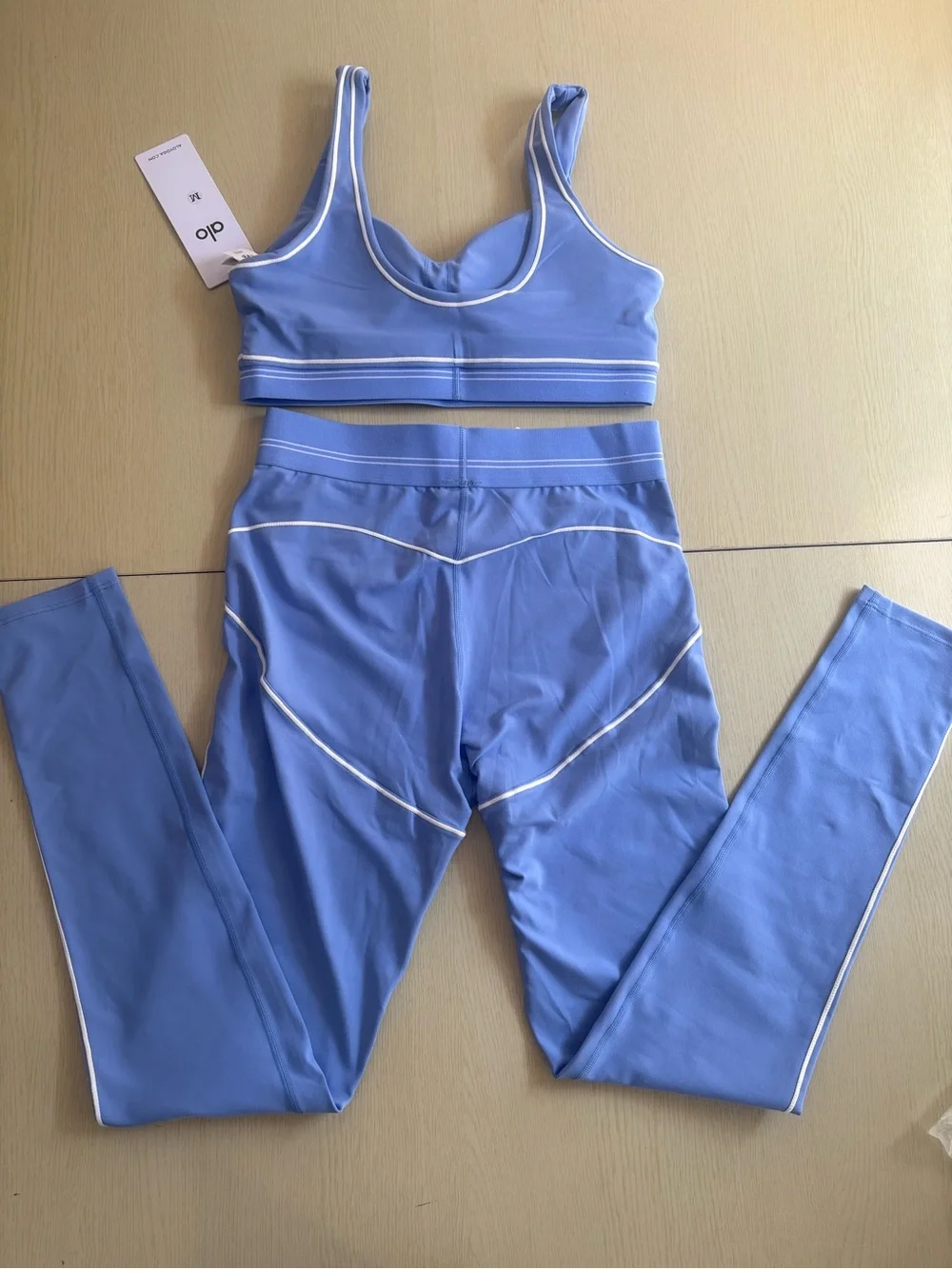 ALO Yoga Blue Sports Bra and Leggings Set with White Piping